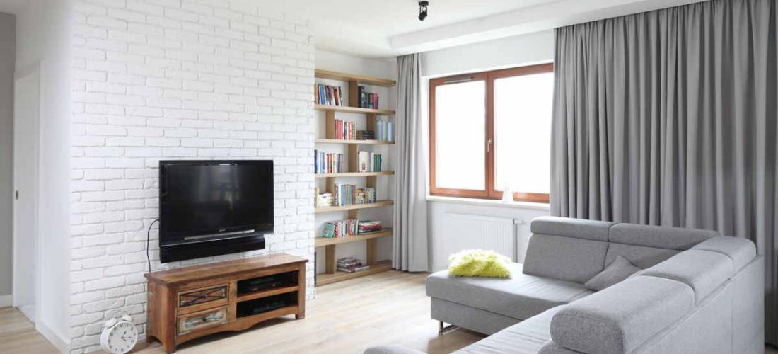Ściana w salonie: 14 eleganckich pomysłów na miejsce na telewizor