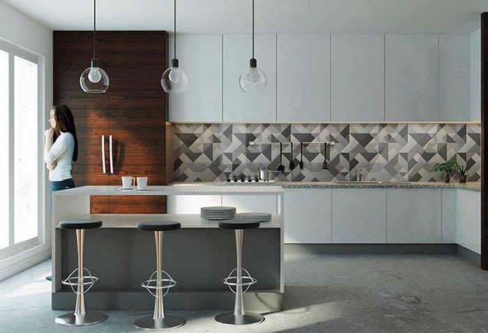 W kuchni wyraźnie dominuje kolor szary. Panel szklany z motywem wzorów geometrycznych, w różnych odcieniach szarości stanowi tu główny akcent dekoracyjny, ładnie wkomponowany w całość szafek kuchennych.